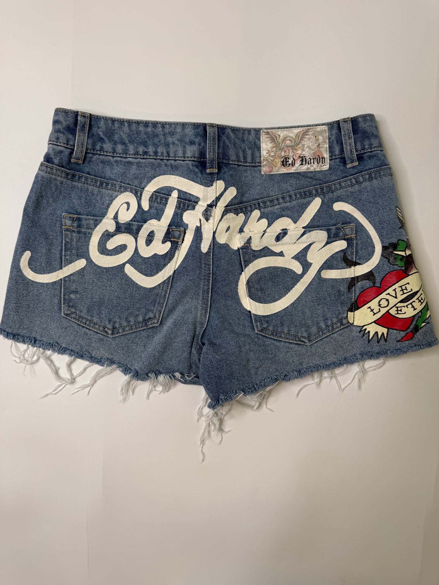 ED HARDY VINTAGE LOVE ETERNAL DENIM CUTOFF SHORTS (S)