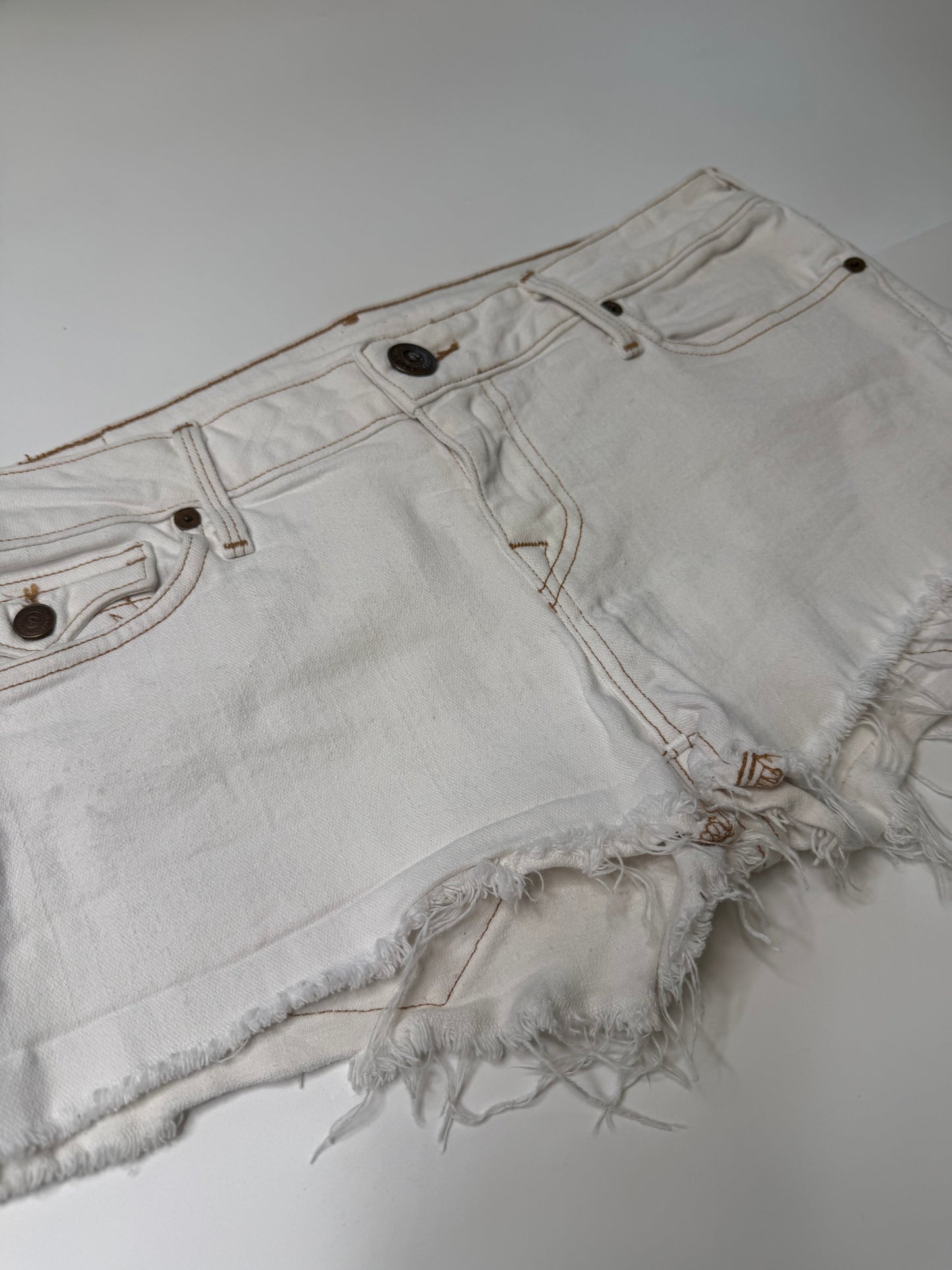TRUE RELIGION VINTAGE FRAYED WHITE DENIM SHORTS