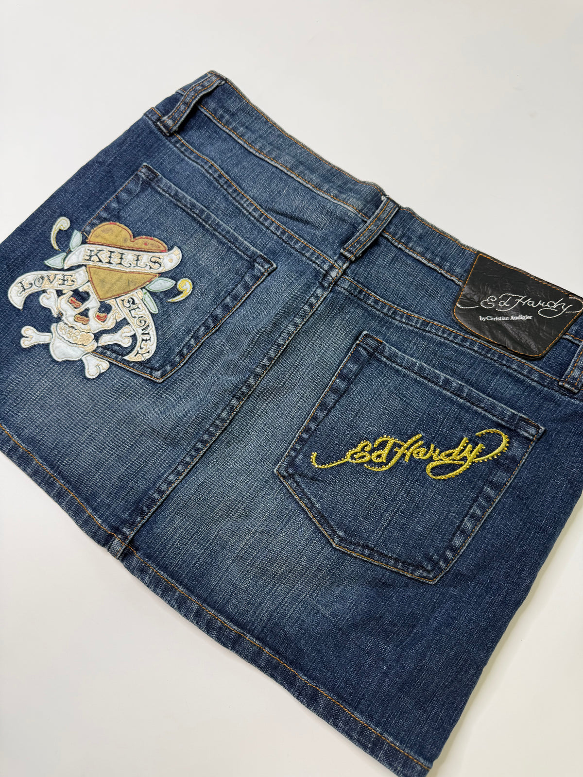 ED HARDY VINTAGE LOVE KILLS SLOWLY DENIM MINI SKIRT (31, M)