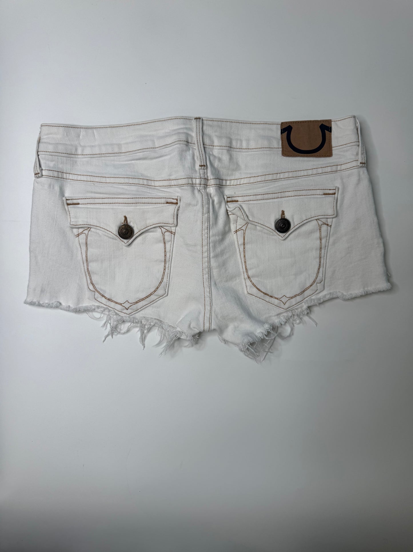 TRUE RELIGION VINTAGE FRAYED WHITE DENIM SHORTS