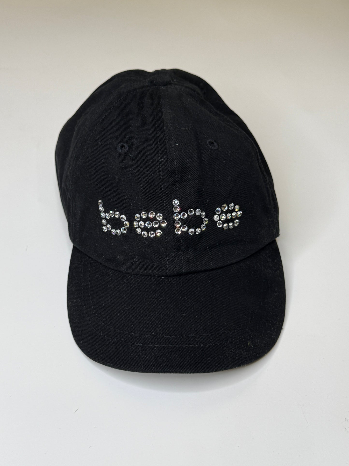 BEBE VINTAGE CAP RHINESTONE LOGO