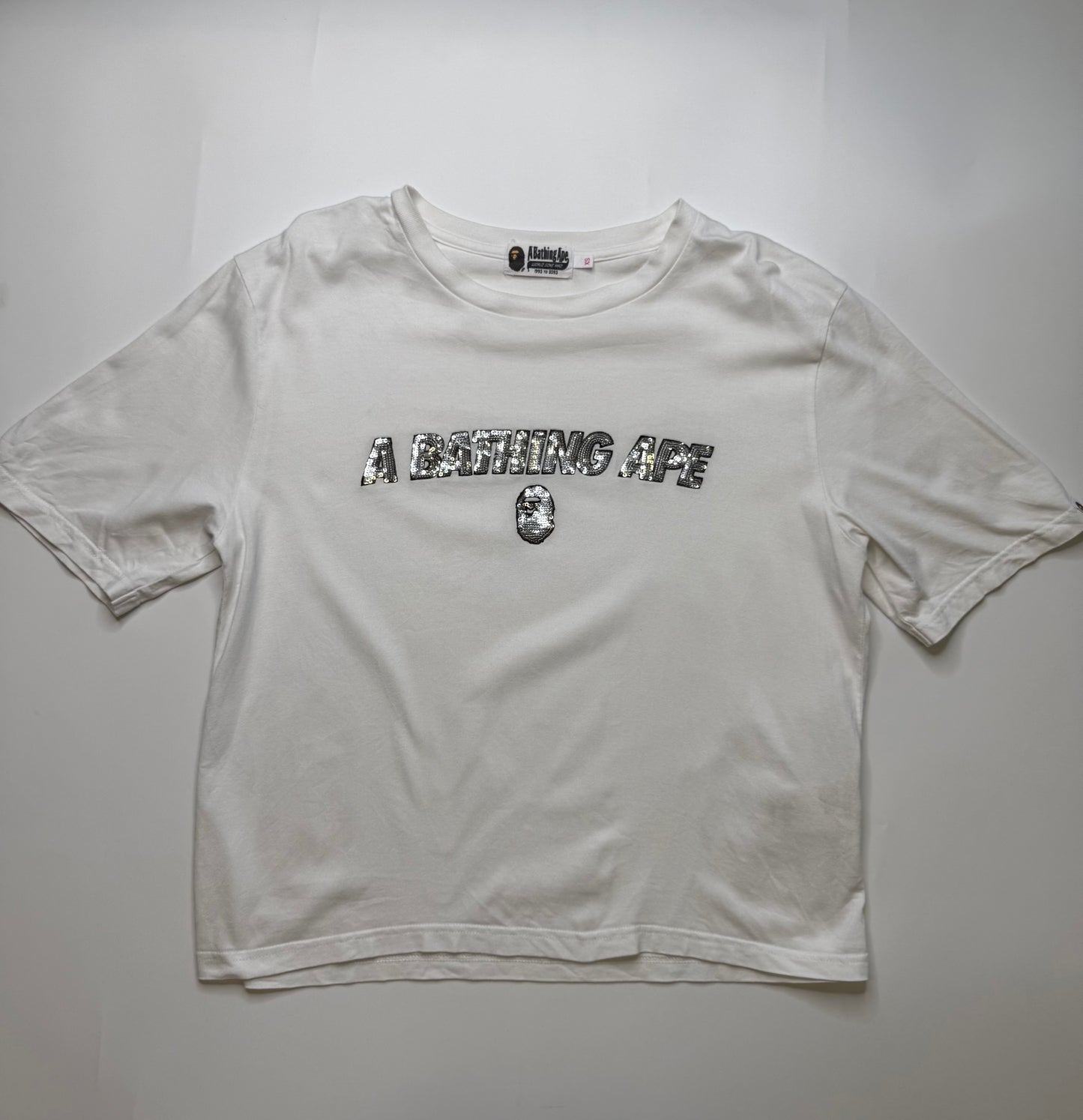 BAPE 30TH ANNIVERSARY SEQUIN LOGO TEE – WHITE (XS)