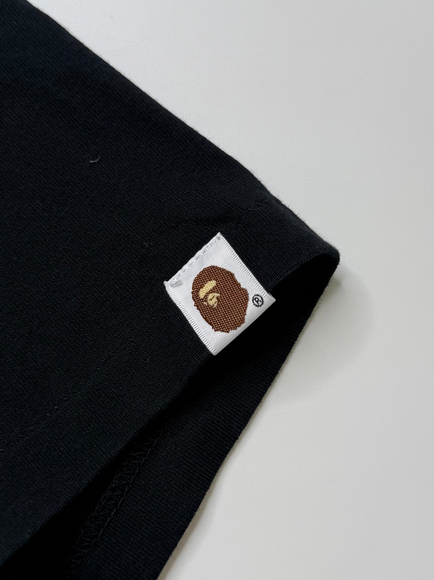 BAPE LADIES COLLEGE LOGO TEE – TIGER CAMO GOLD (XS)