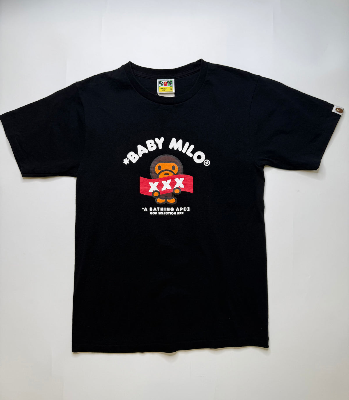 BAPE BABY MILO X GOD SELECTION XXX TEE – BLACK (S)