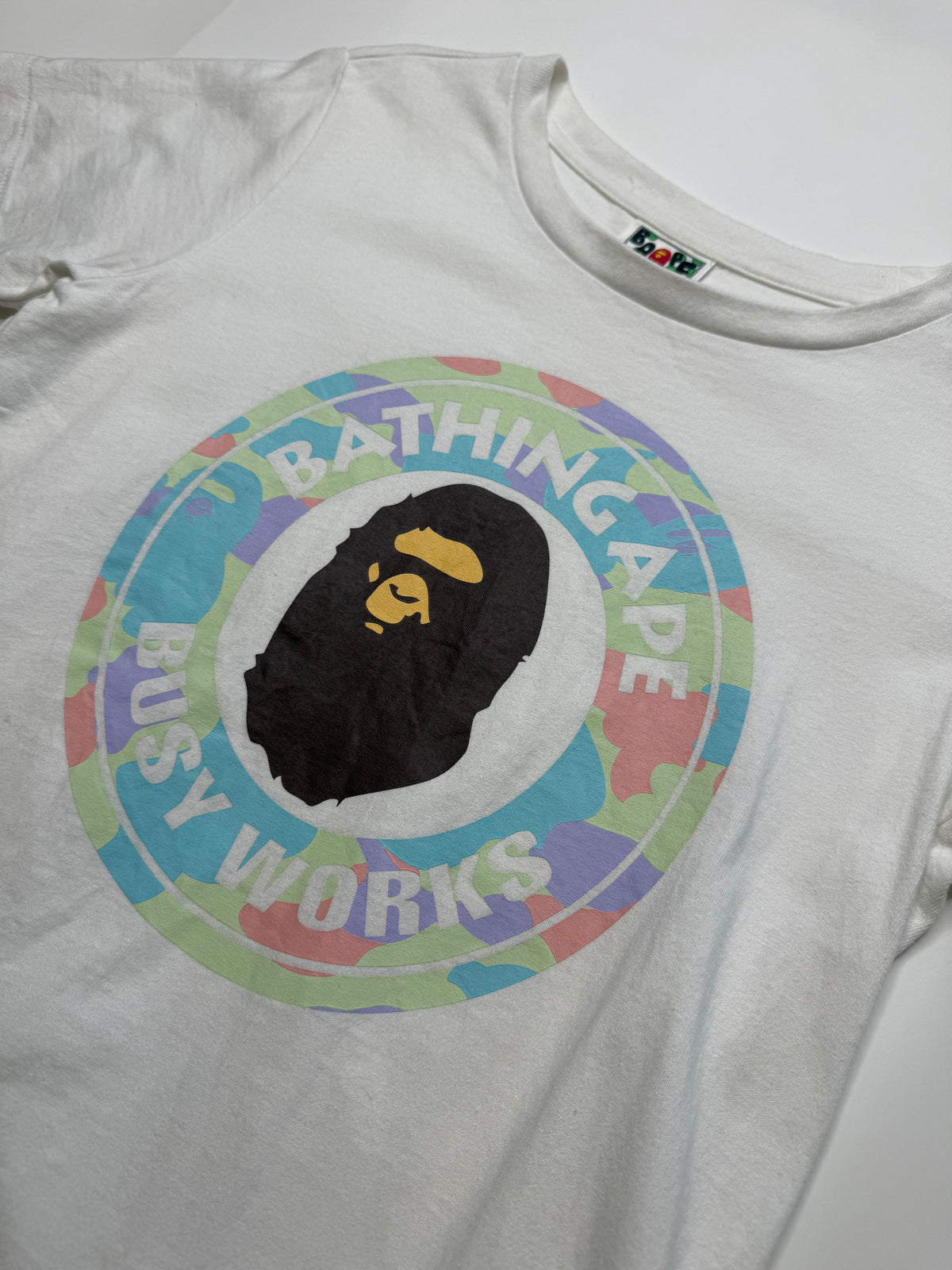 BAPE BUSY WORKS CIRCLE LOGO TEE – PASTEL CAMO (XS)