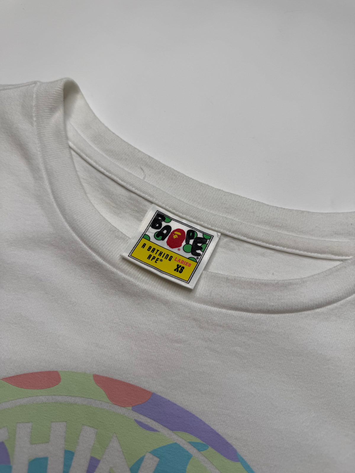 BAPE BUSY WORKS CIRCLE LOGO TEE – PASTEL CAMO (XS)
