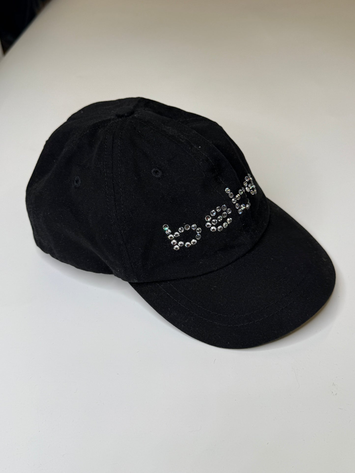 BEBE VINTAGE CAP RHINESTONE LOGO