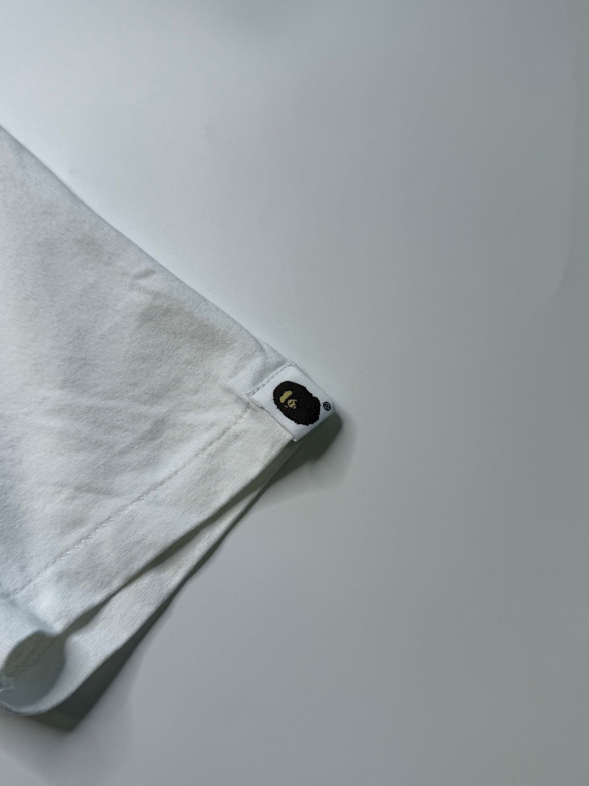 BAPE BY BATHING APE TEE – WHITE PURPLE (XS)